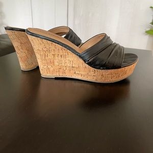 Spring sandal in leather and cork, 4 inch heels.